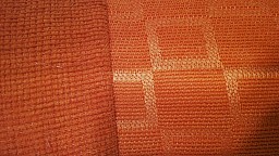 Netradiční čalouněná pohovka PAULA s rozkladem oranžová / oranžový vzor